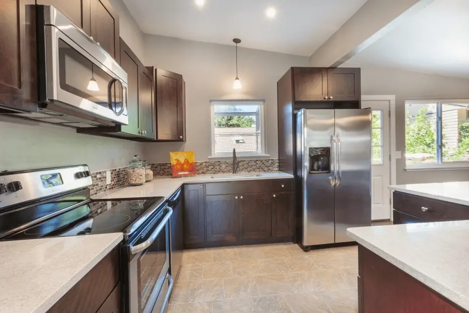 Clean White/Cream Countertops with Brown Cabinets